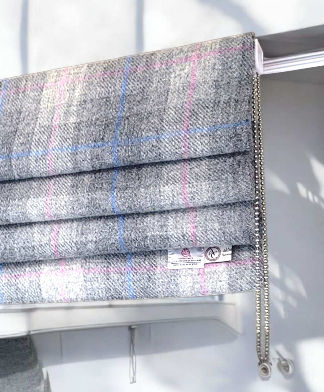 Harris Tweed Roman blind in check in grey tones with pink check